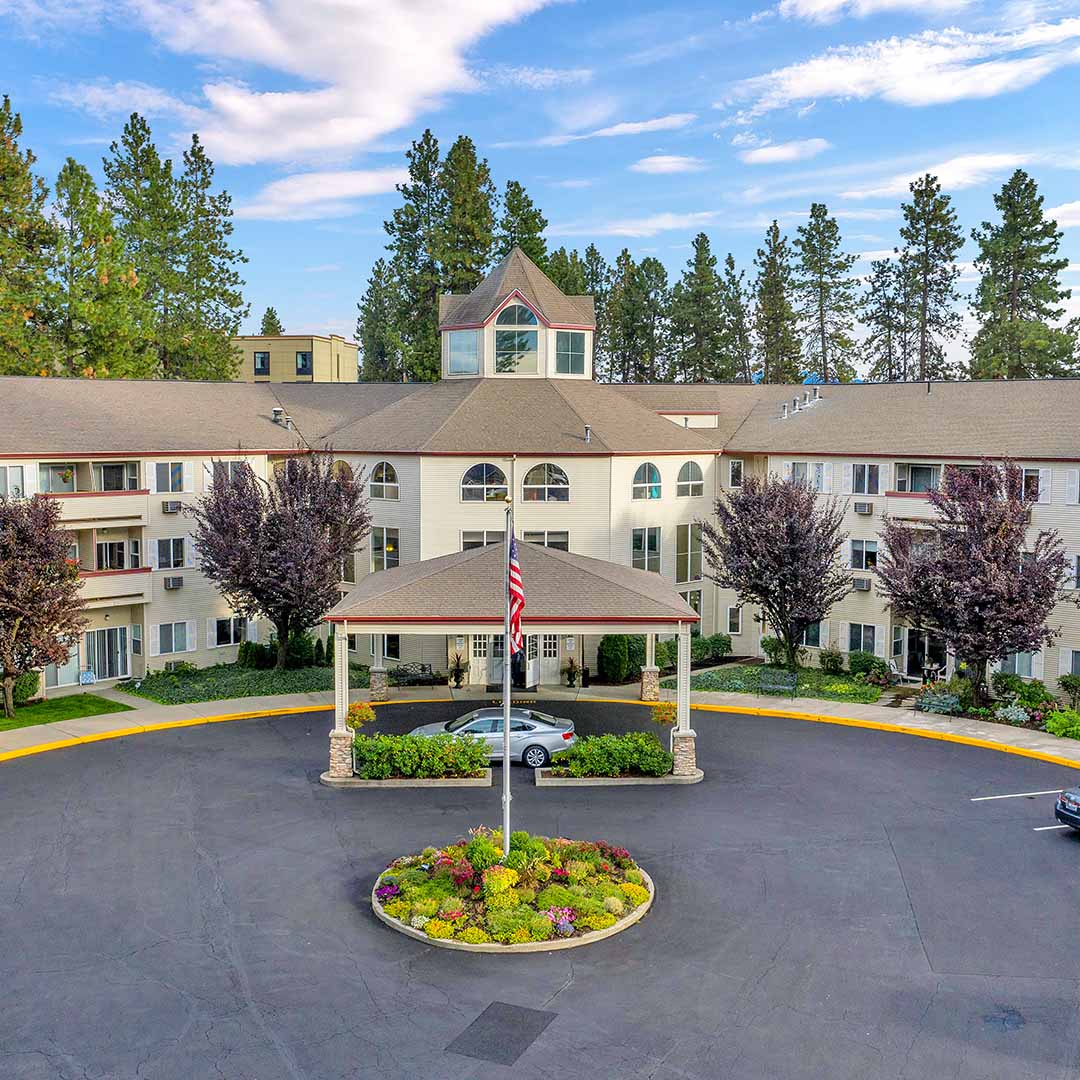 Copper Creek Senior Living South Jordan Utah front entrance at sunset