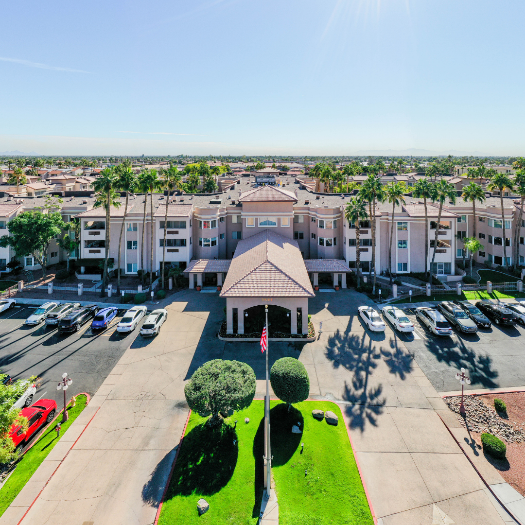 Aerial view of the Palms at Sun City front entrance and parking lot