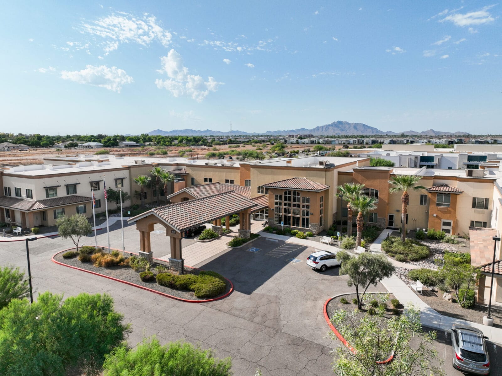 Copper Creek Senior Living South Jordan Utah front entrance at sunset