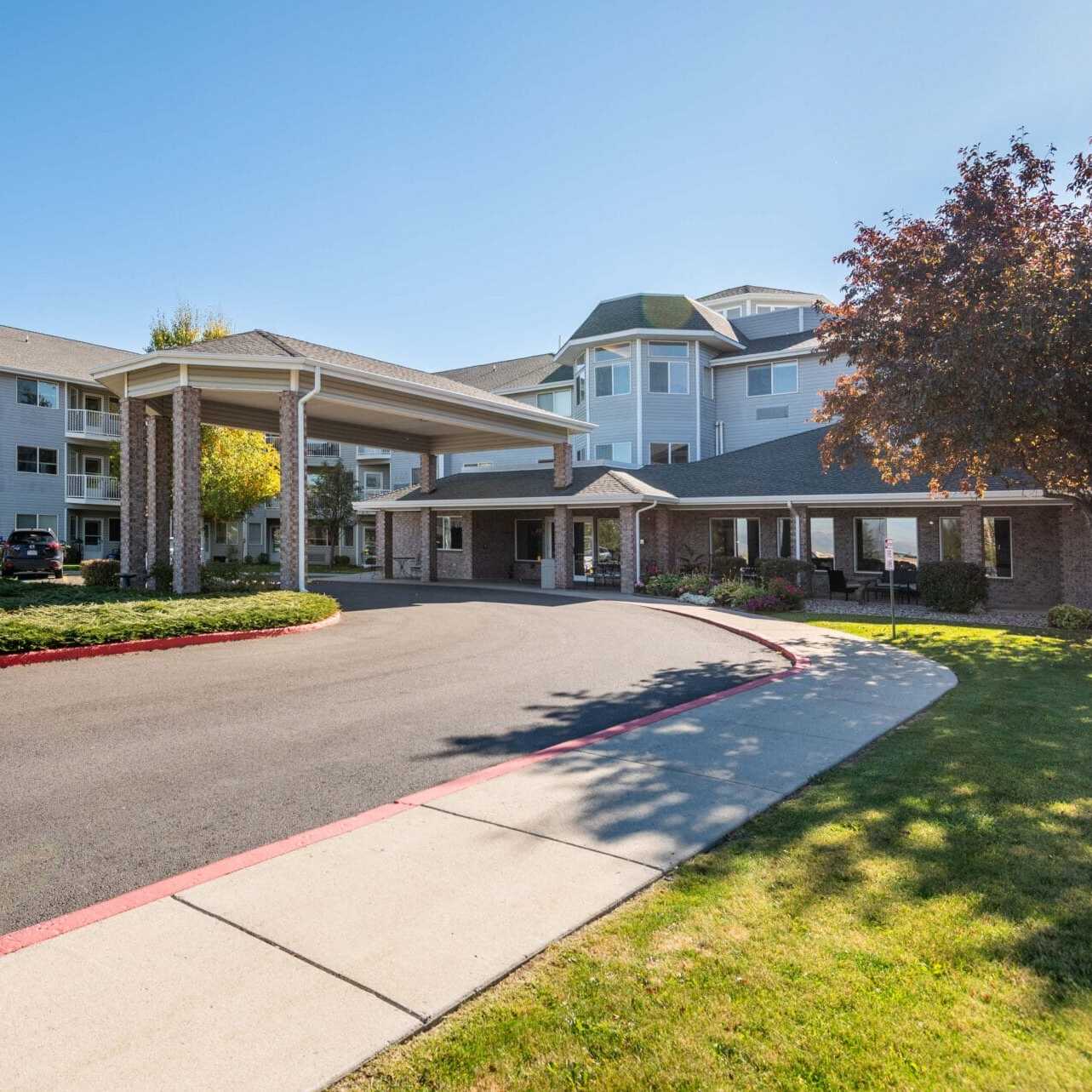 Copper Creek Senior Living South Jordan Utah front entrance at sunset