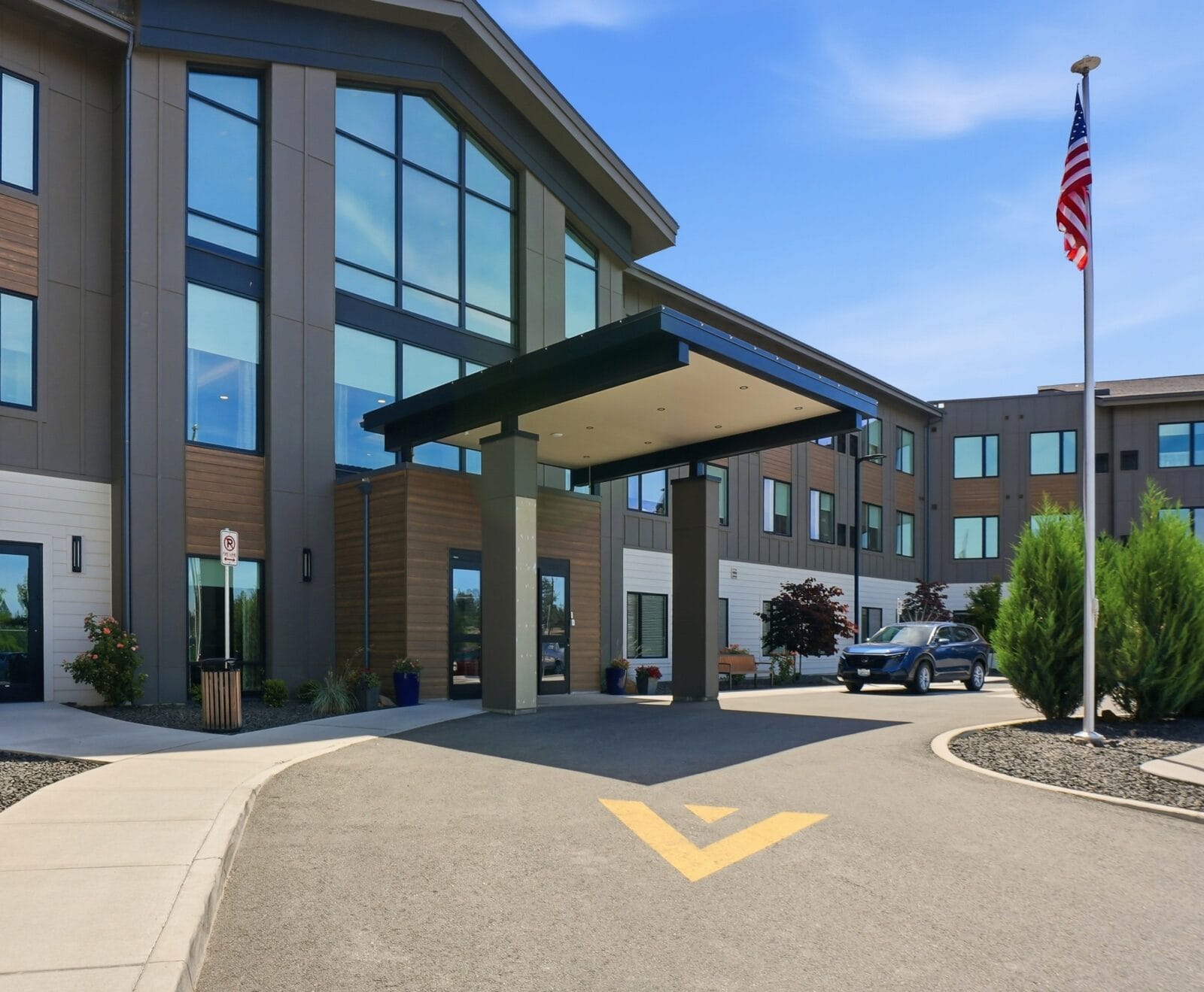 Inside-Media-Regal-6 copy Copper Creek Senior Living South Jordan Utah front entrance at sunset