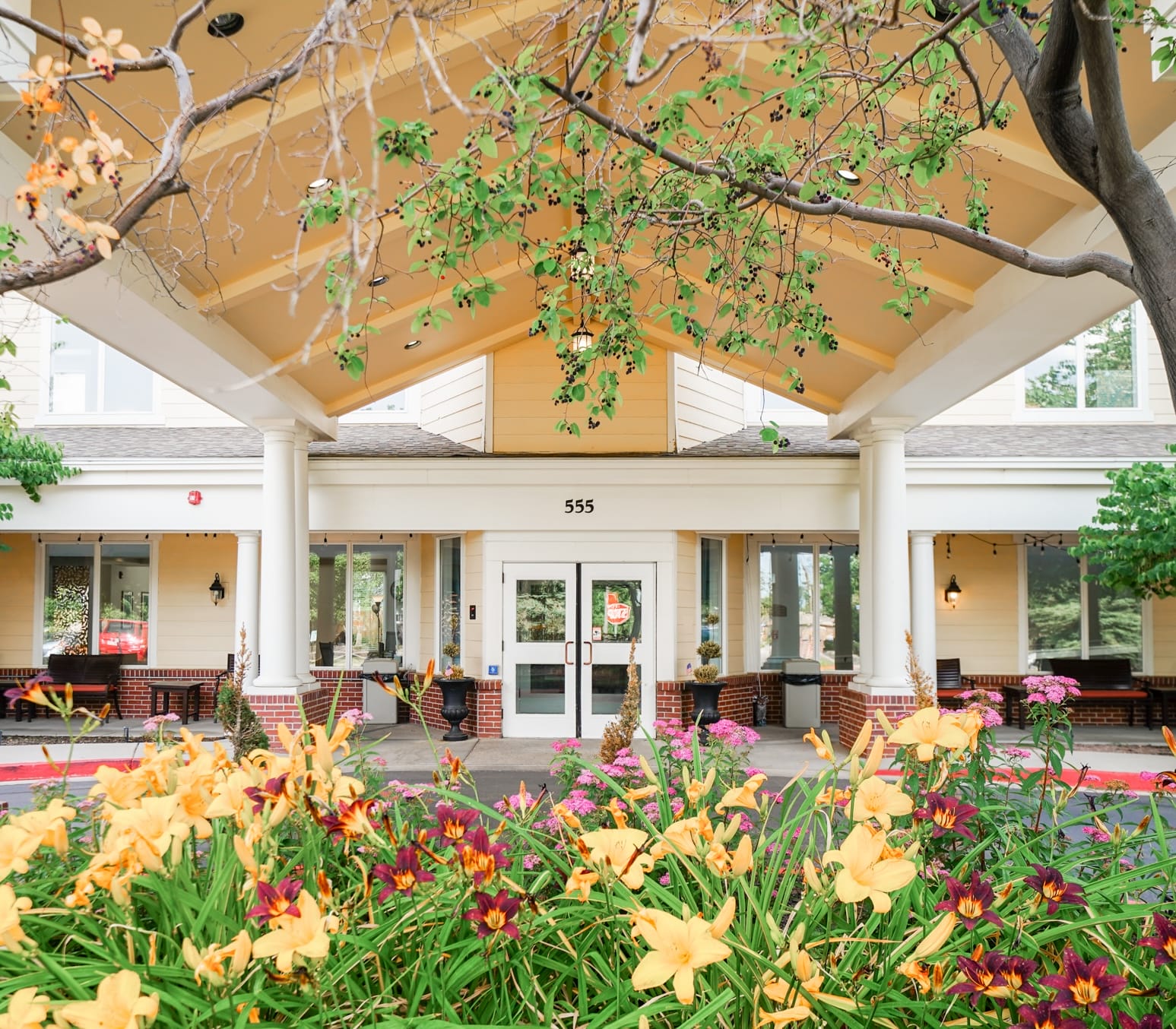 Copper Creek Senior Living South Jordan Utah front entrance at sunset