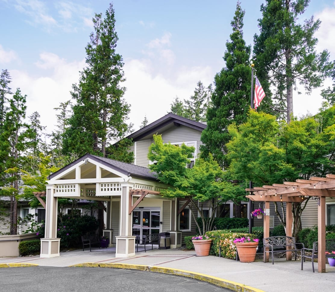 Copper Creek Senior Living South Jordan Utah front entrance at sunset