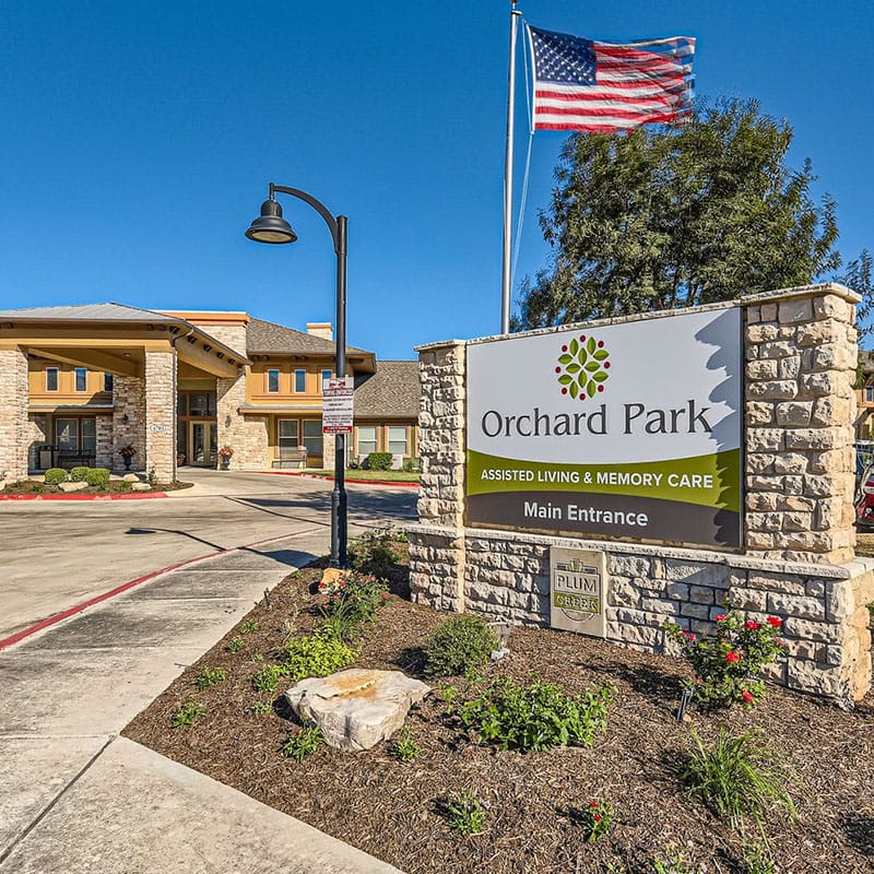 Copper Creek Senior Living South Jordan Utah front entrance at sunset