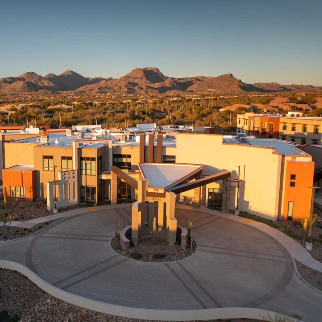 Copper Creek Senior Living South Jordan Utah front entrance at sunset