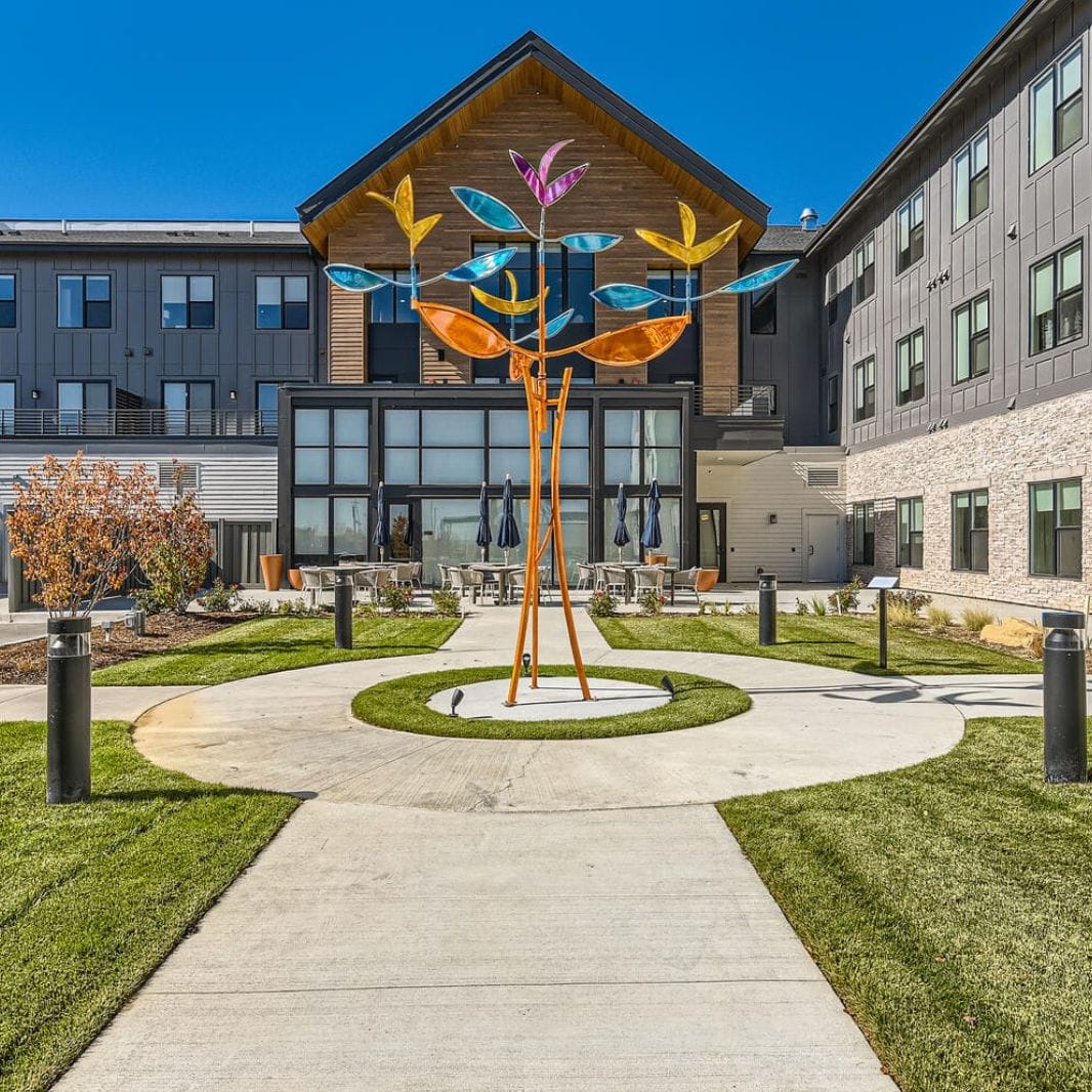 Copper Creek Senior Living South Jordan Utah front entrance at sunset