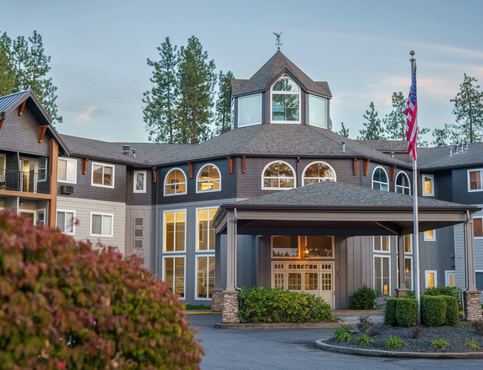 Entry squared Copper Creek Senior Living South Jordan Utah front entrance at sunset