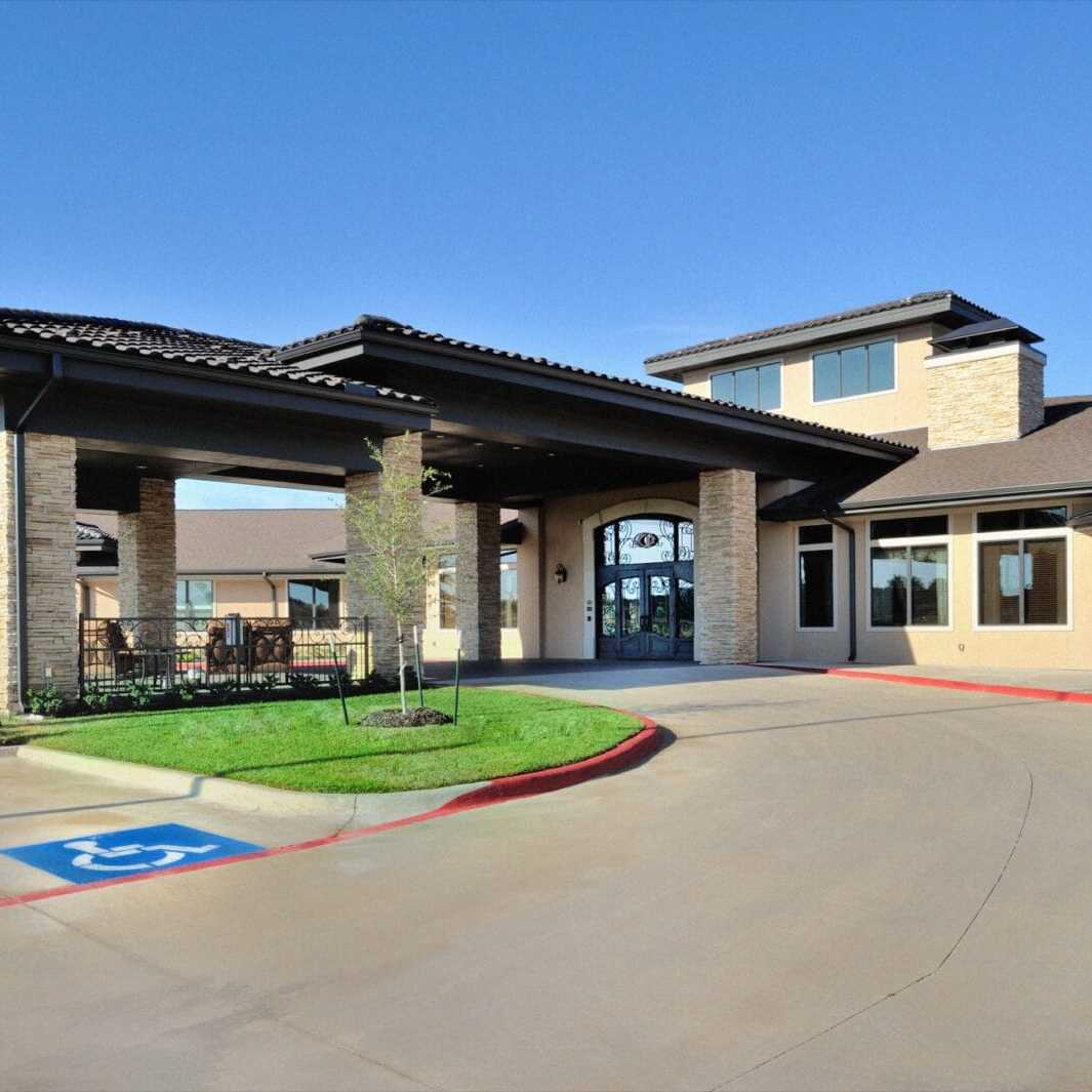 Copper Creek Senior Living South Jordan Utah front entrance at sunset