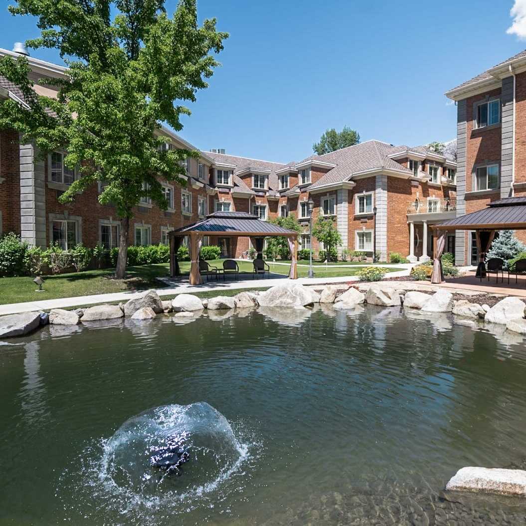 Copper Creek Senior Living South Jordan Utah front entrance at sunset