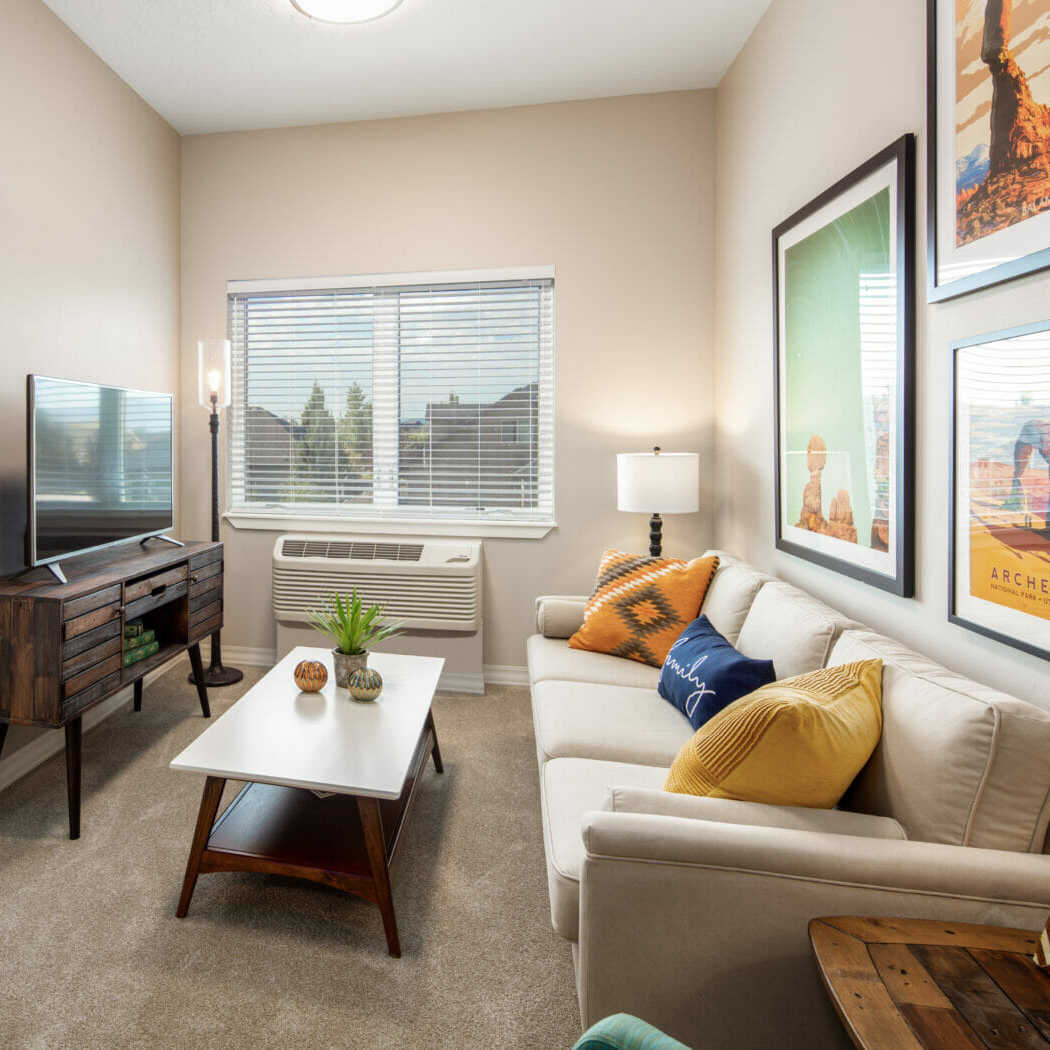 Copper Creek Senior Living Community in South Jordan Utah view of one bedroom apartment and living room