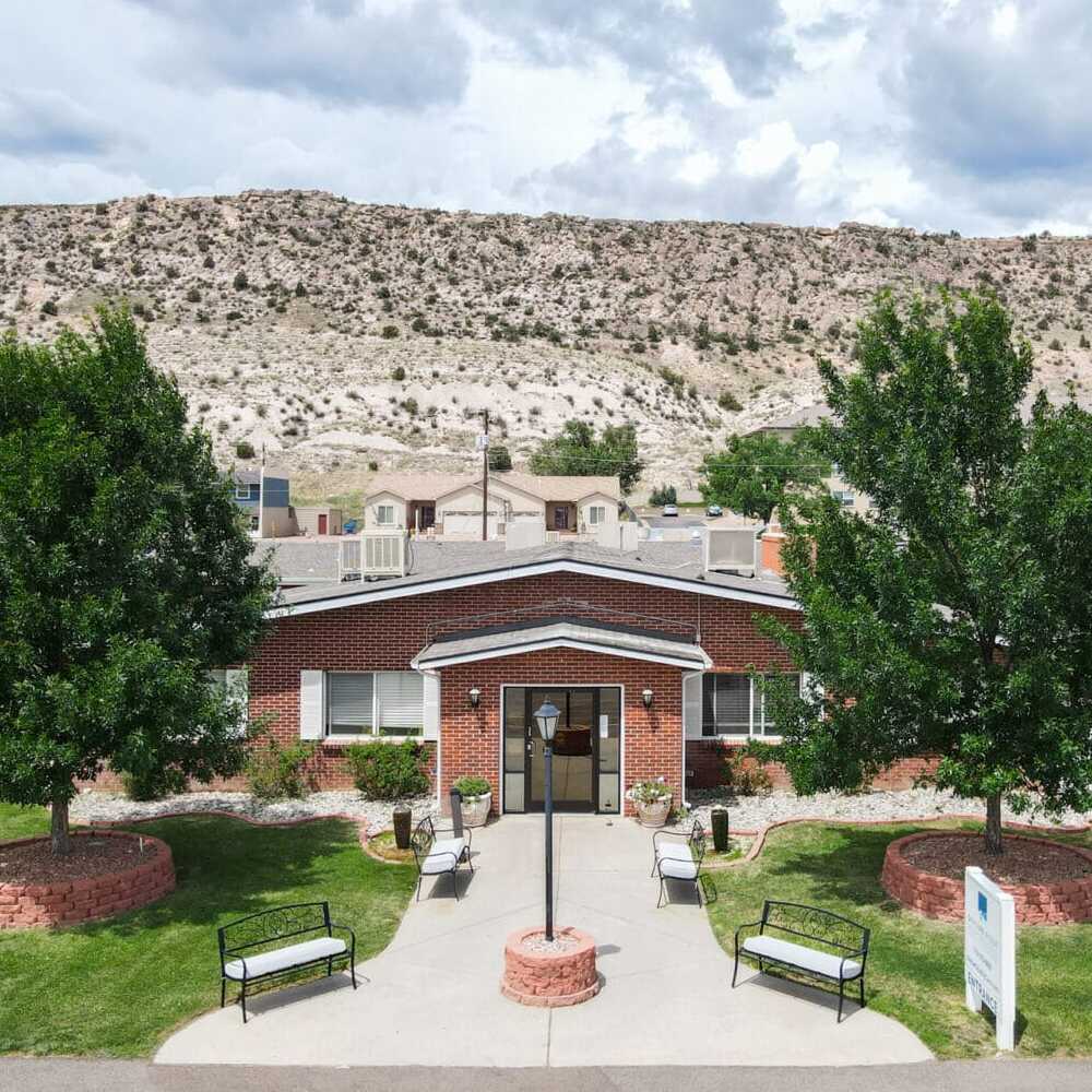 Copper Creek Senior Living South Jordan Utah front entrance at sunset