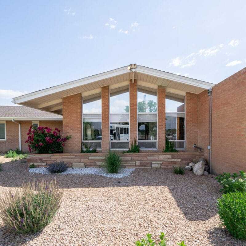 1exterior6-2 (1) Copper Creek Senior Living South Jordan Utah front entrance at sunset