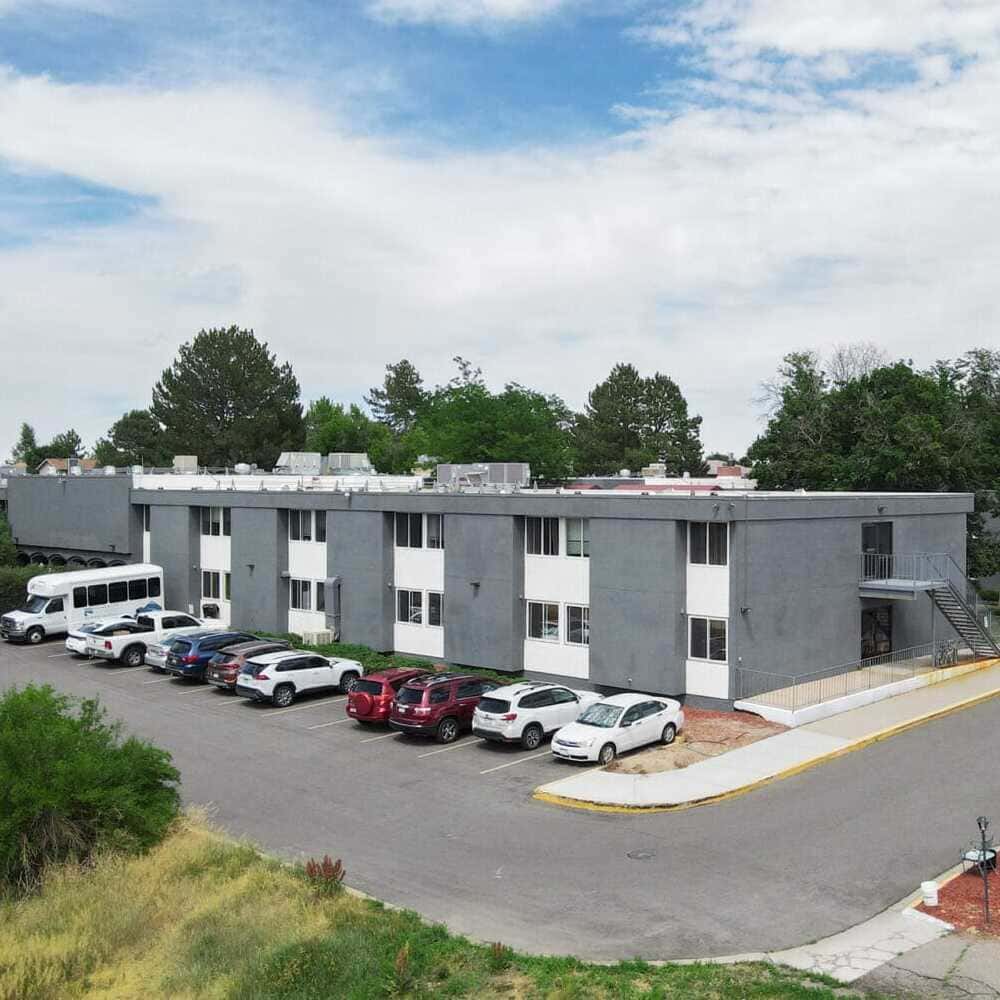 Cherrelynn-3 (1) Copper Creek Senior Living South Jordan Utah front entrance at sunset