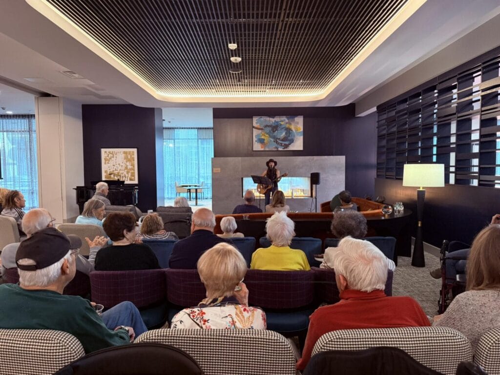 Acoya Cherry Creek Seniors enjoying a live musical performance