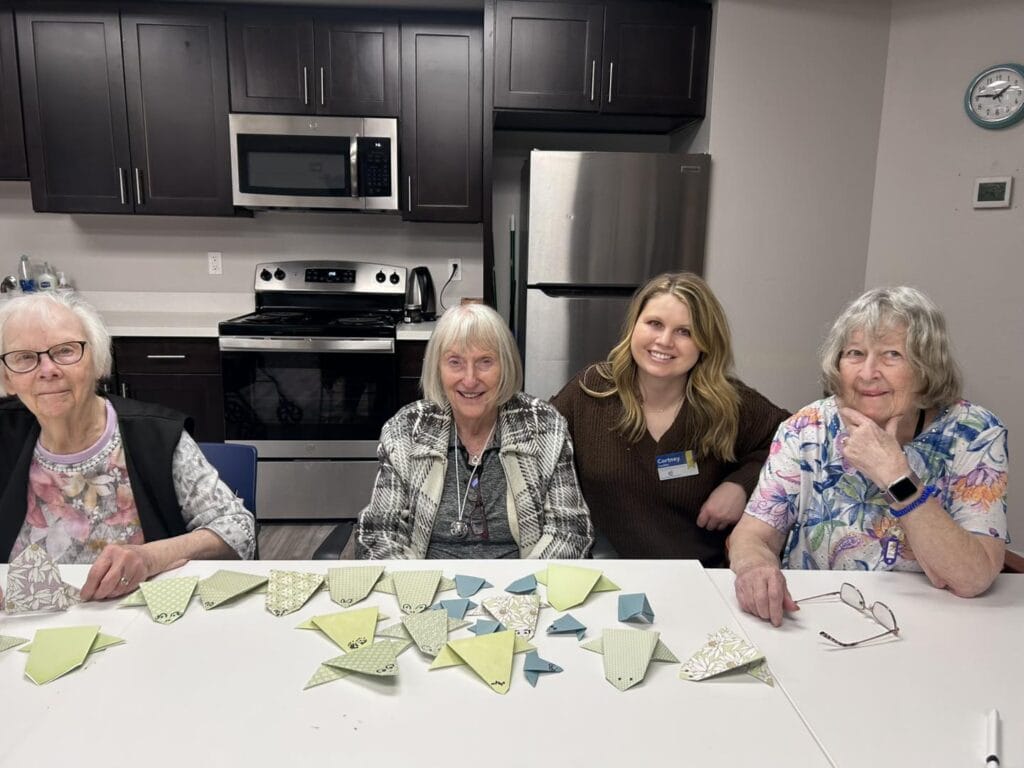 Overlake Terrace Senior Living in Redmond residents do a paper craft