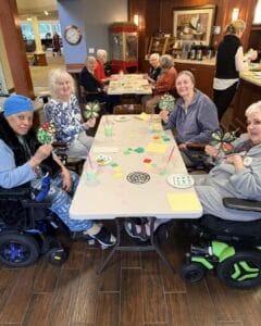 Assisted living residents celebrating St Patrick's day
