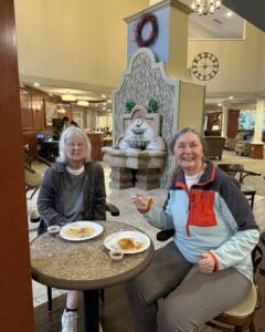 Assisted living residents enjoy pancakes