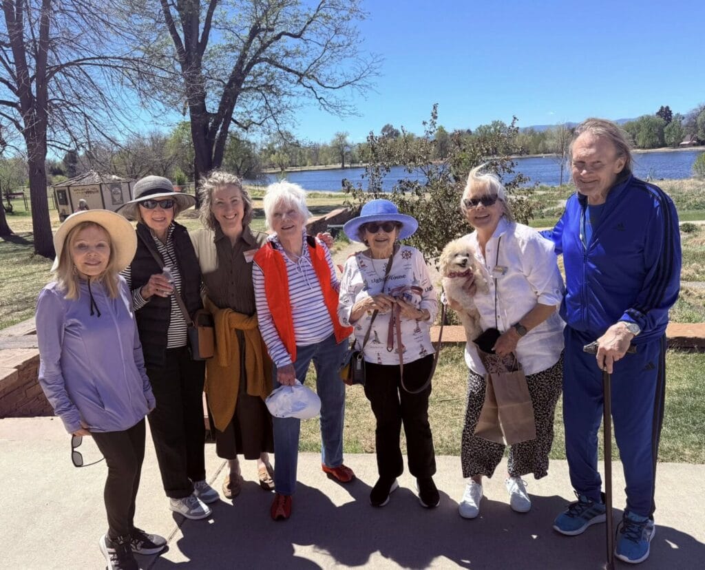 Seniors at Acoya Cherry Creek enjoy a walk in the park