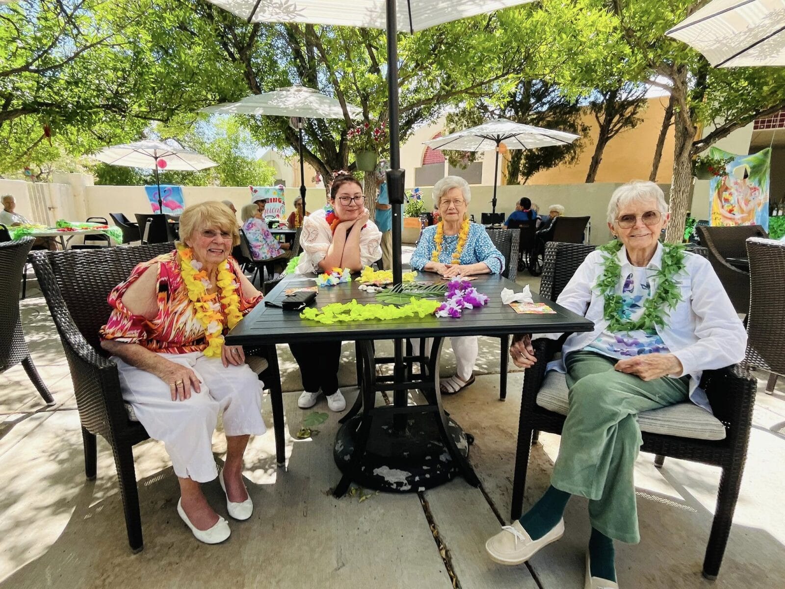 Assisted living residents in the courtyard at The Montebello