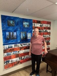 Bobby Jone's with his 9/11 Art that hangs at Sandia Vista Senior Living